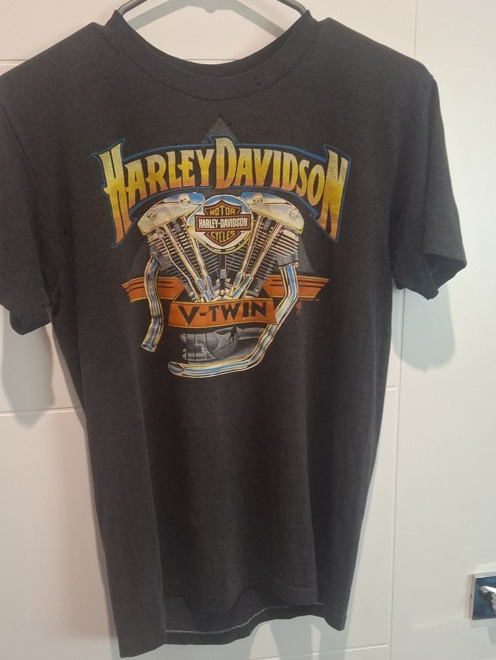 Harley-Davidson Black V-Twin Engine Graphic Tee with Yellow & Orange Logos